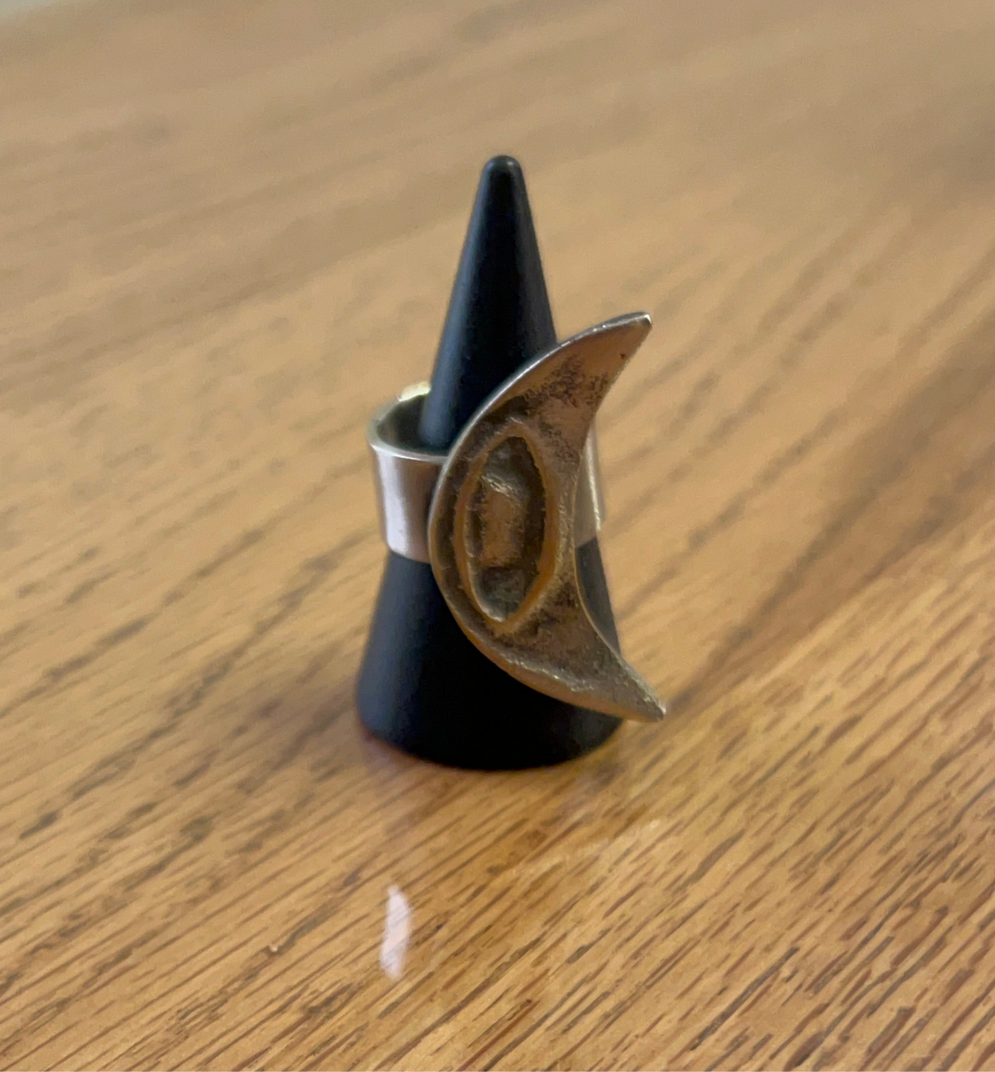 Silver plated crescent with eyes shape ring