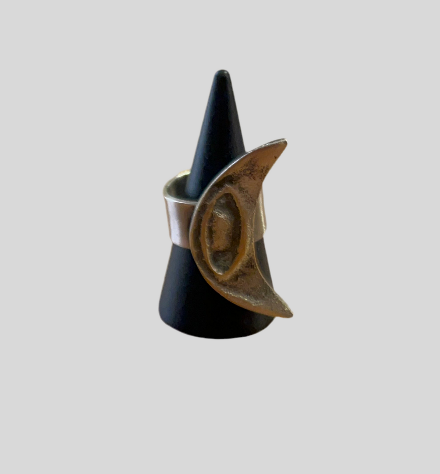 Silver plated crescent with eyes shape ring