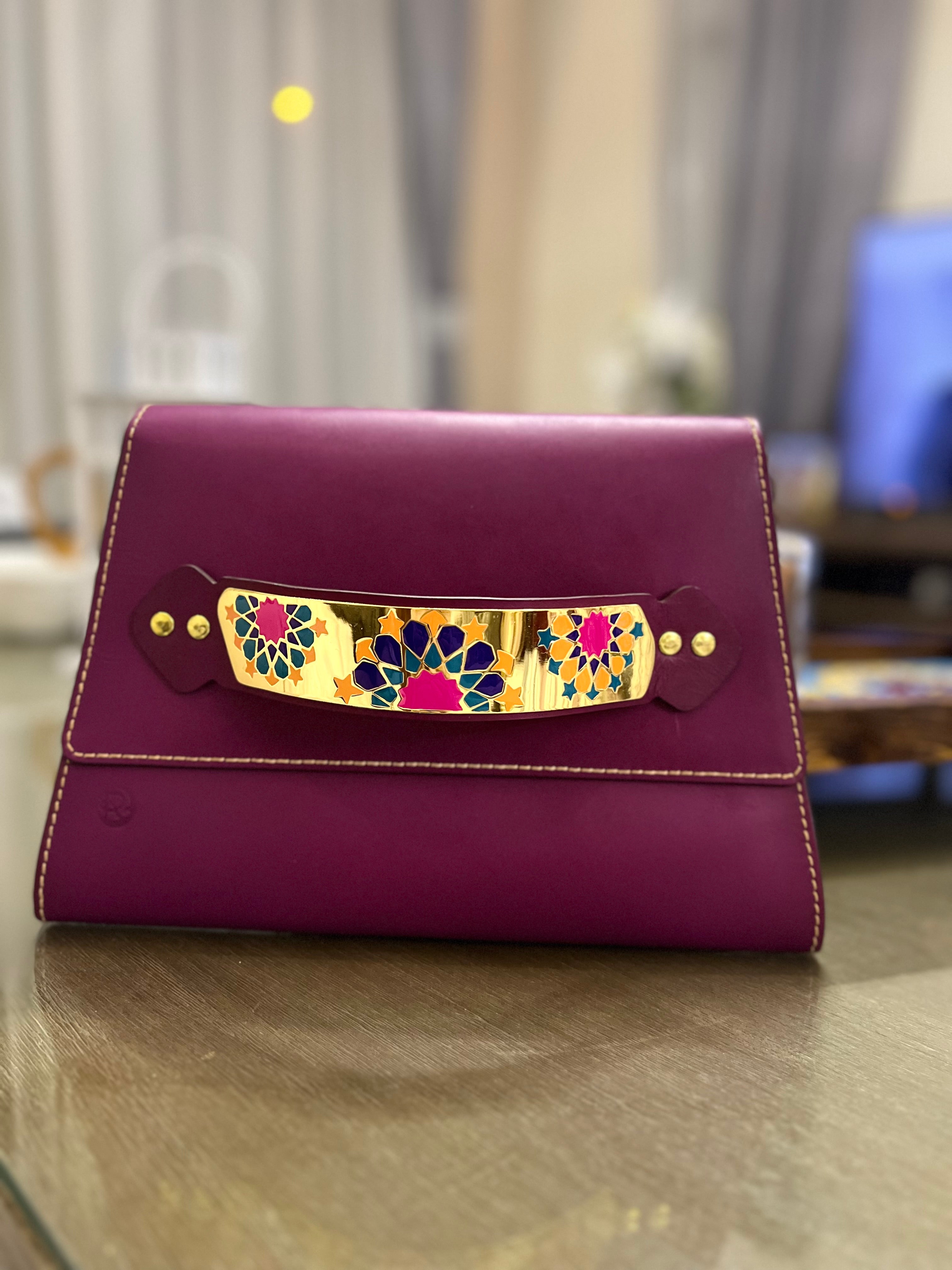 Handmade clutch with gold/silver plated handle