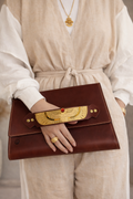 Handmade clutch with gold/silver plated handle