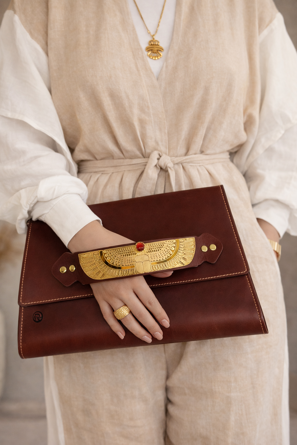 Handmade clutch with gold/silver plated handle