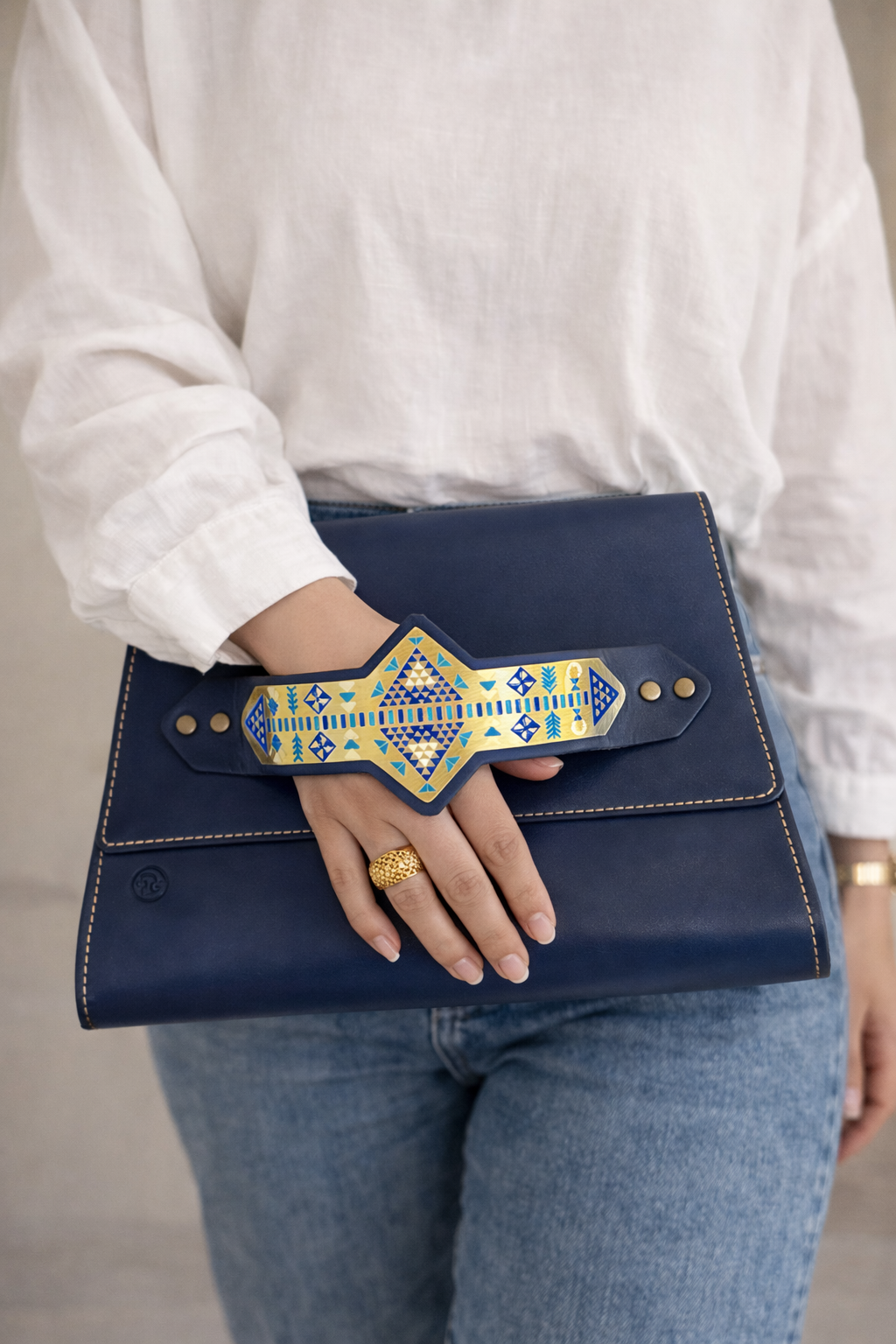 Handmade clutch with gold/silver plated handle