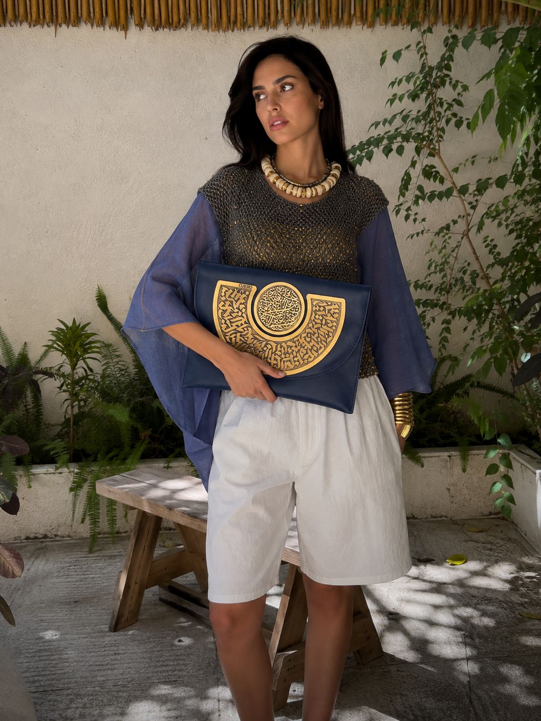 Blue leather Calligraphy clutch
