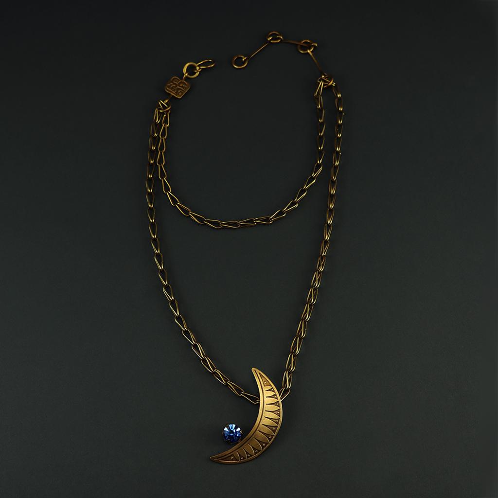 Crescent brass necklace